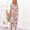 Hollow Floral Pocketed Tie Jumpsuit - FINAL SALE